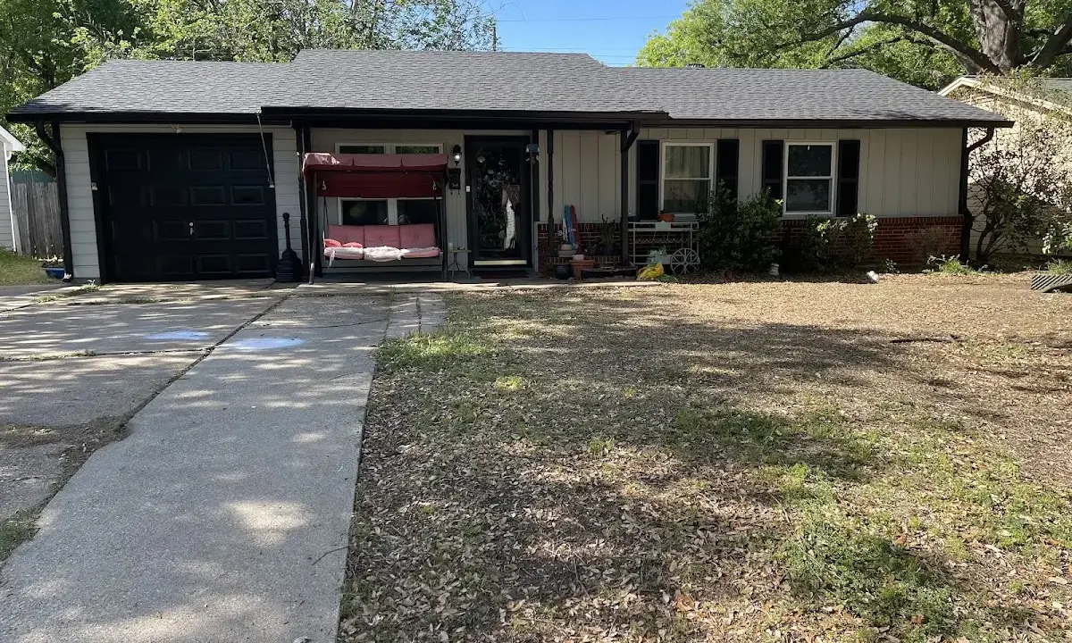 Asphalt Shingle Roof Repair crew at work on a residential roof in Fairburn